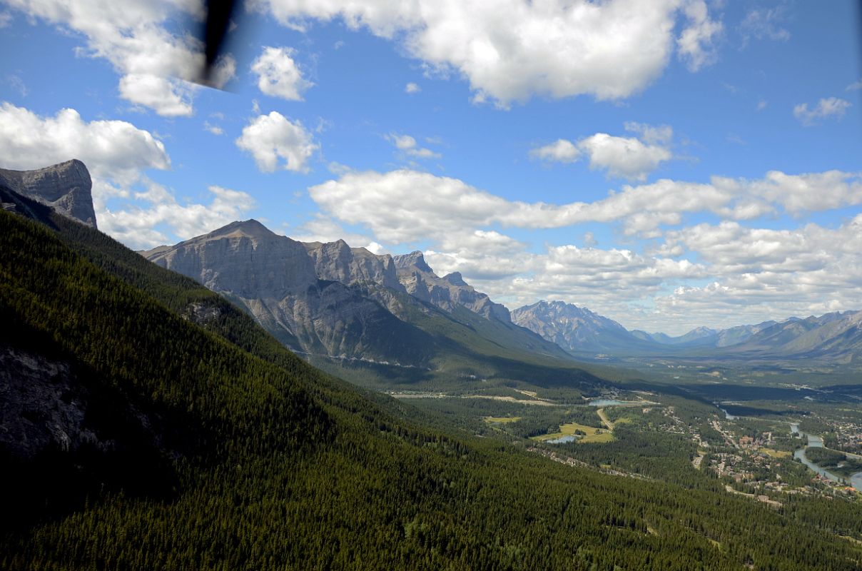 13 Canmore, Ha Ling Peak, Mount Rundle, Cascade Mountain As Helicopter From Lake Magog Prepares To Land In Canmore